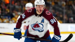 Apr 14, 2024; Las Vegas, Nevada, USA; Colorado Avalanche right wing Mikko Rantanen (96) talks to a team mate before a face off against the Vegas Golden Knights during the second period at T-Mobile Arena. Mandatory Credit: Stephen R. Sylvanie-USA TODAY Sports