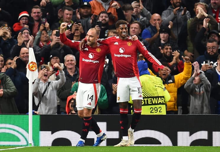 epa11624673 Manchester United's Christian Eriksen (L) celebrates with Marcus Rashford after scoring the 1-0 during the UEFA Europa League match between Manchester United and Twente Enschede in Manchester, Britain, 25 September 2024.  EPA-EFE/PETER POWELL