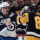 Nov 22, 2024; Pittsburgh, Pennsylvania, USA; Winnipeg Jets left wing Kyle Connor (81) and Pittsburgh Penguins center Sidney Crosby (87) fight during the second period at PPG Paints Arena. Mandatory Credit: Charles LeClaire-Imagn Images