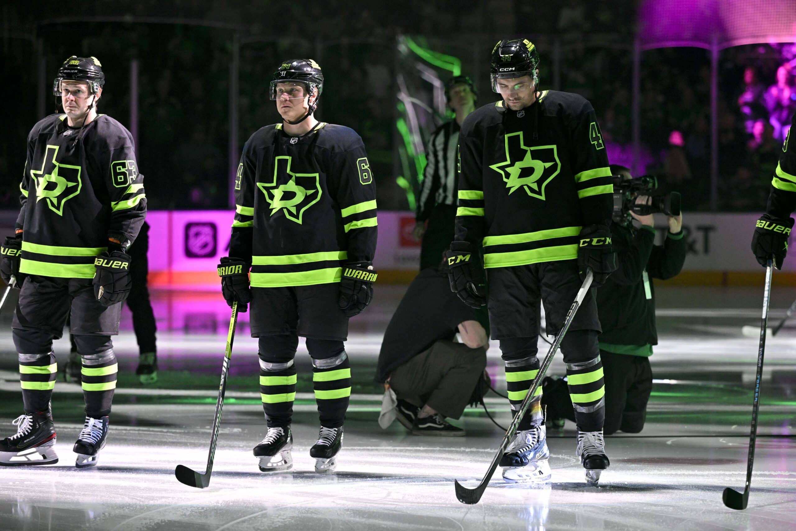 Feb 2, 2025; Dallas, Texas, USA; (from left) Dallas Stars right wing Evgenii Dadonov (63) and center Mikael Granlund (64) and defenseman Cody Ceci (44) are introduced before the game against the Columbus Blue Jackets at the American Airlines Center. Mandatory Credit: Jerome Miron-Imagn Images