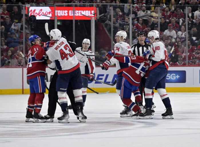 Apr 25, 2025; Montreal, Quebec, CAN; Tussles between Montreal Canadiens forward Brendan Gallagher (11) and Washington Capitals forward Tom Wilson (43) and forward Pierre-Luc Dubois (80) and Montreal Canadiens forward Cole Caufield (13) during the second period in game three of the first round of the 2025 Stanley Cup Playoffs at the Bell Centre. Mandatory Credit: Eric Bolte-Imagn Images