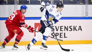 epa11142009 The Czech Republic's Jan Kostalek (L) and Finland's Henrik Borgstrom in action during the Beijer Hockey Games (Euro Hockey Tour) ice hockey match between Finland and the Czech Republic at Lofbergs Arena in Karlstad, Sweden, 10 February 2024.  EPA-EFE/Pontus Lundahl SWEDEN OUT