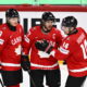 epa12097688 Canada's Sidney Crosby (C) celebrates scoring the 3-0 goal with his teammates Canada's Nate MacKinnon (L) and Bo Horvat (R) during the 2025 IIHF Ice Hockey World Championship group A match between Canada and France, in Stockholm, Sweden, 13 May 2025.  EPA-EFE/Anders Wiklund  SWEDEN OUT