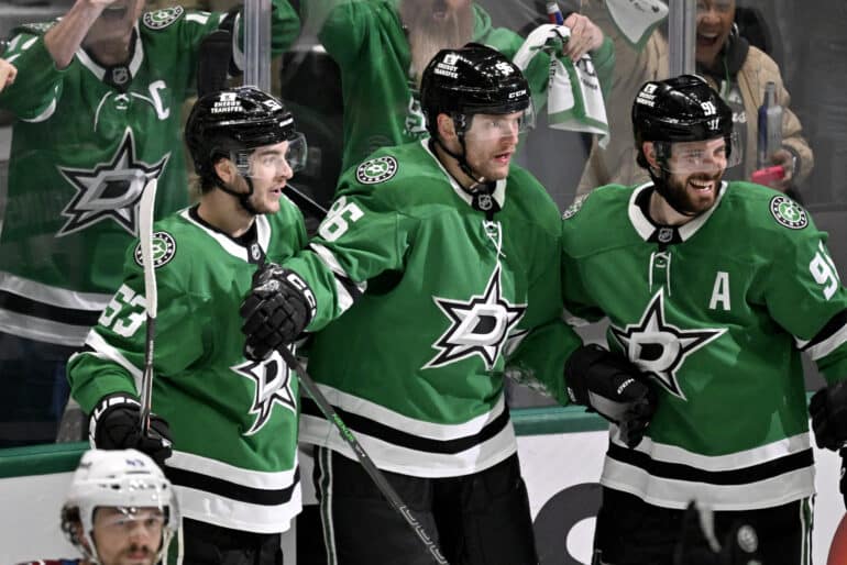 May 3, 2025; Dallas, Texas, USA; Dallas Stars right wing Mikko Rantanen (96) and center Tyler Seguin (91) and center Wyatt Johnston (53) celebrates the game tying goal goal scored by Rantanen against the Colorado Avalanche during the third period in game seven of the first round of the 2025 Stanley Cup Playoffs at American Airlines Center. Mandatory Credit: Jerome Miron-Imagn Images