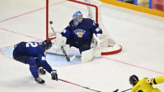 epa12094971 Sweden's Jonas Brodin (R, partially seen) scores the 2-0 goal against Finland's goalkeeper Juuse Saros (C) during the IIHF Ice Hockey World Championship group A match between Finland and Sweden, in Stockholm, Sweden, 12 May 2025.  EPA-EFE/Anders Wiklund  SWEDEN OUT