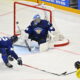 epa12094971 Sweden's Jonas Brodin (R, partially seen) scores the 2-0 goal against Finland's goalkeeper Juuse Saros (C) during the IIHF Ice Hockey World Championship group A match between Finland and Sweden, in Stockholm, Sweden, 12 May 2025.  EPA-EFE/Anders Wiklund  SWEDEN OUT