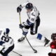 epaselect epa12023318 Finland's Tommi Tikka (C) in action during the friendly international ice hockey match between Latvia and Finland in Riga, Latvia, 10 April 2025.  EPA-EFE/TOMS KALNINS