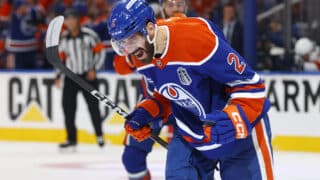Jun 6, 2025; Edmonton, Alberta, CAN; Edmonton Oilers defenseman Evan Bouchard (2) reacts after scoring a goal against the Florida Panthers during the first period in game two of the 2025 Stanley Cup Final at Rogers Place. Mandatory Credit: Perry Nelson-Imagn Images