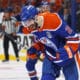 Jun 6, 2025; Edmonton, Alberta, CAN; Edmonton Oilers defenseman Evan Bouchard (2) reacts after scoring a goal against the Florida Panthers during the first period in game two of the 2025 Stanley Cup Final at Rogers Place. Mandatory Credit: Perry Nelson-Imagn Images