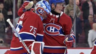 Sep 23, 2024; Montreal, Quebec, CAN; Montreal Canadiens goalie Jakub Dobes (75) and forward Patrik Laine (92) celebrate the win against the Philadelphia Flyers at the Bell Centre. Mandatory Credit: Eric Bolte-Imagn Images